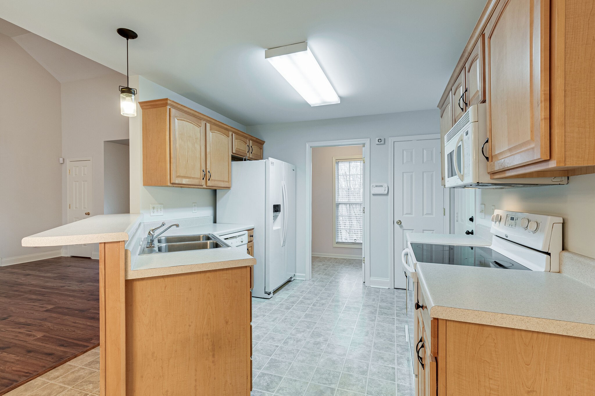 113 Lear Road Portland, TN 37148 - Photo 13 of 28 a utility room with cabinets washer and dryer