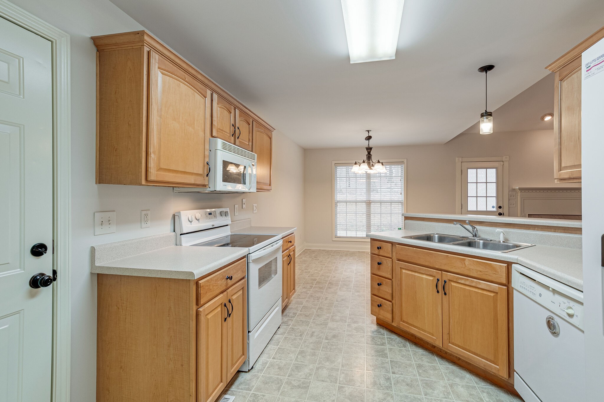 113 Lear Road Portland, TN 37148 - Photo 15 of 28 a kitchen with a sink stove and cabinets