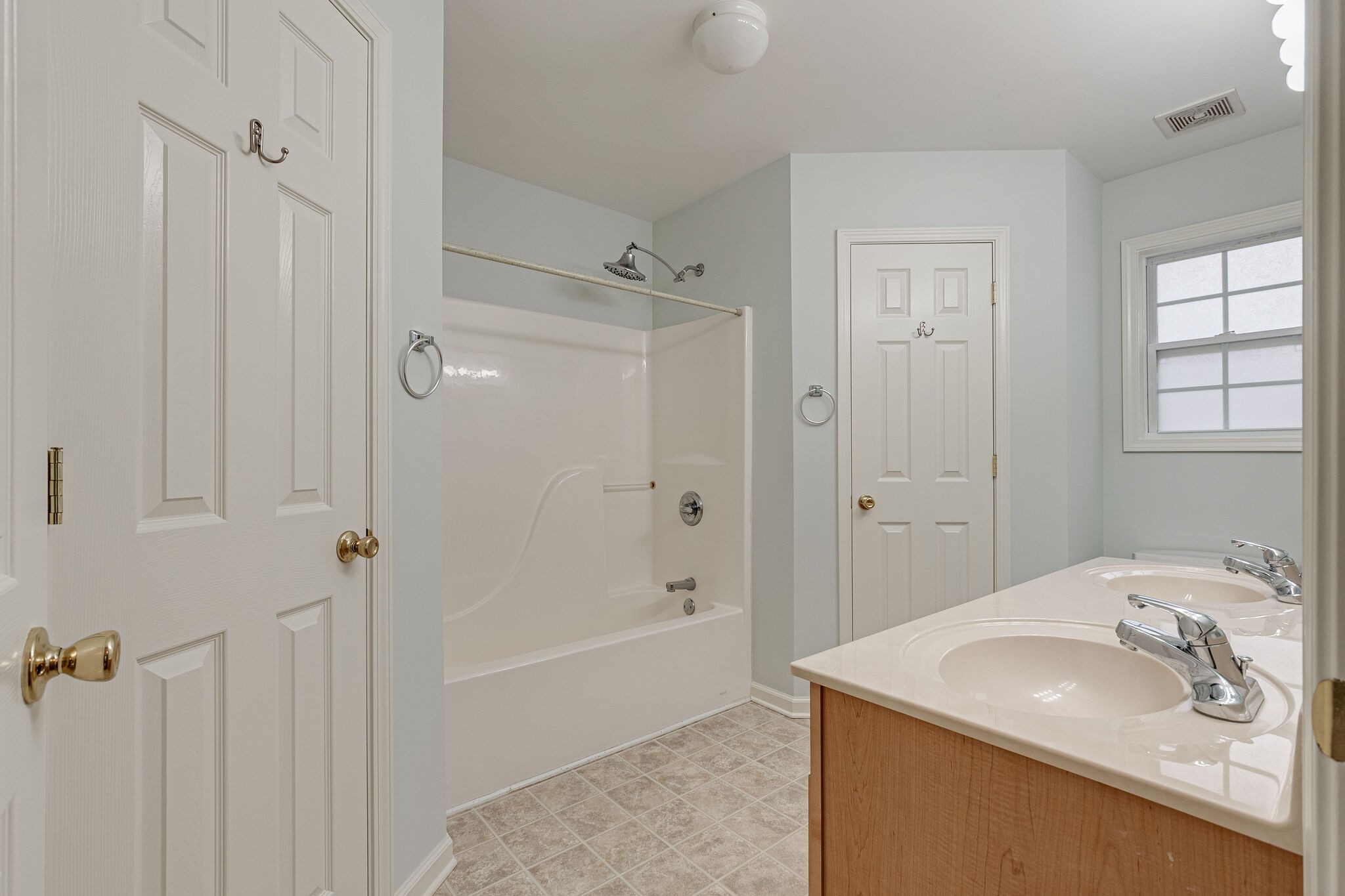 113 Lear Road Portland, TN 37148 - Photo 18 of 28 a bathroom with a granite countertop sink a shower and a mirror