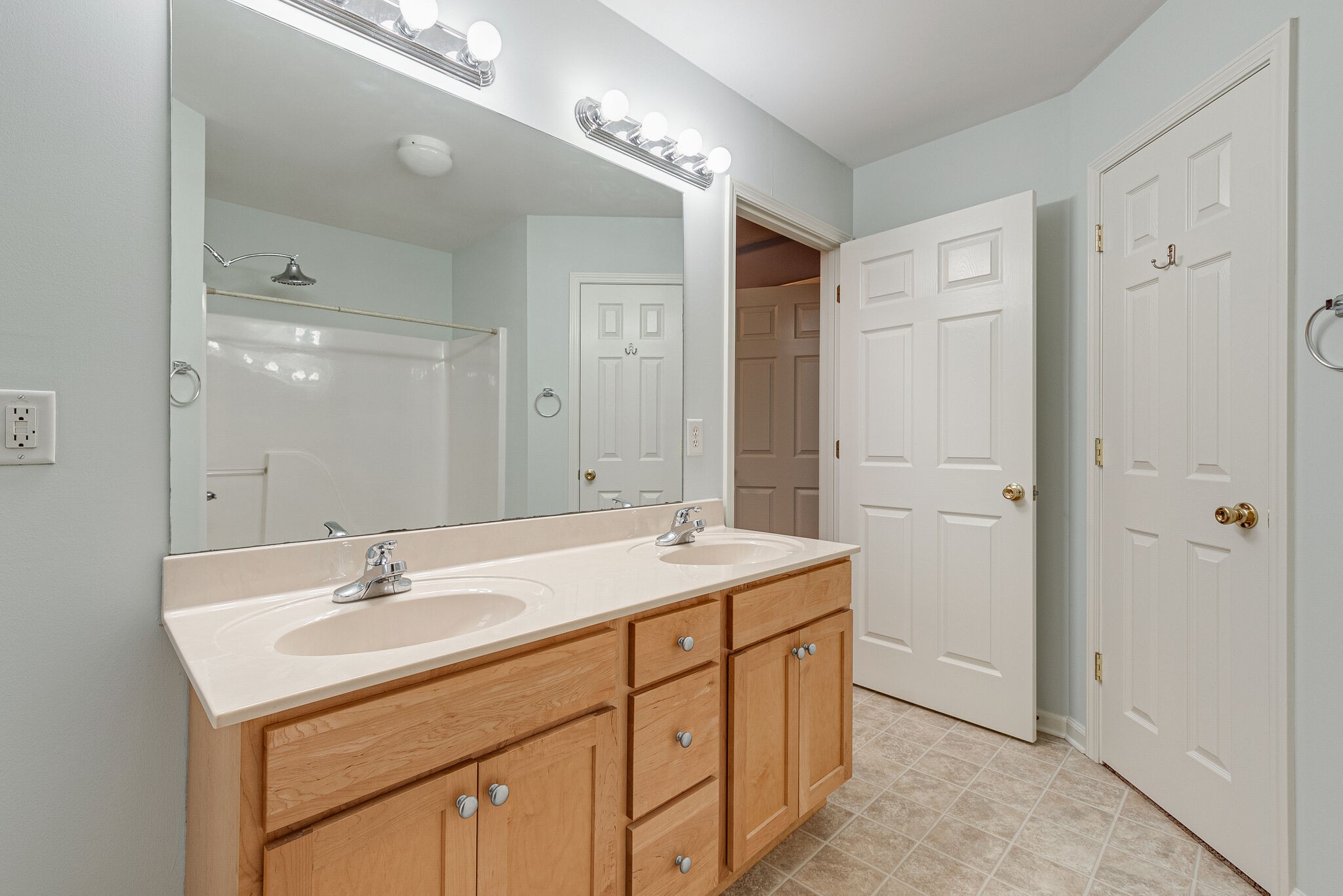 113 Lear Road Portland, TN 37148 - Photo 19 of 28 a bathroom with a sink double vanity and a mirror
