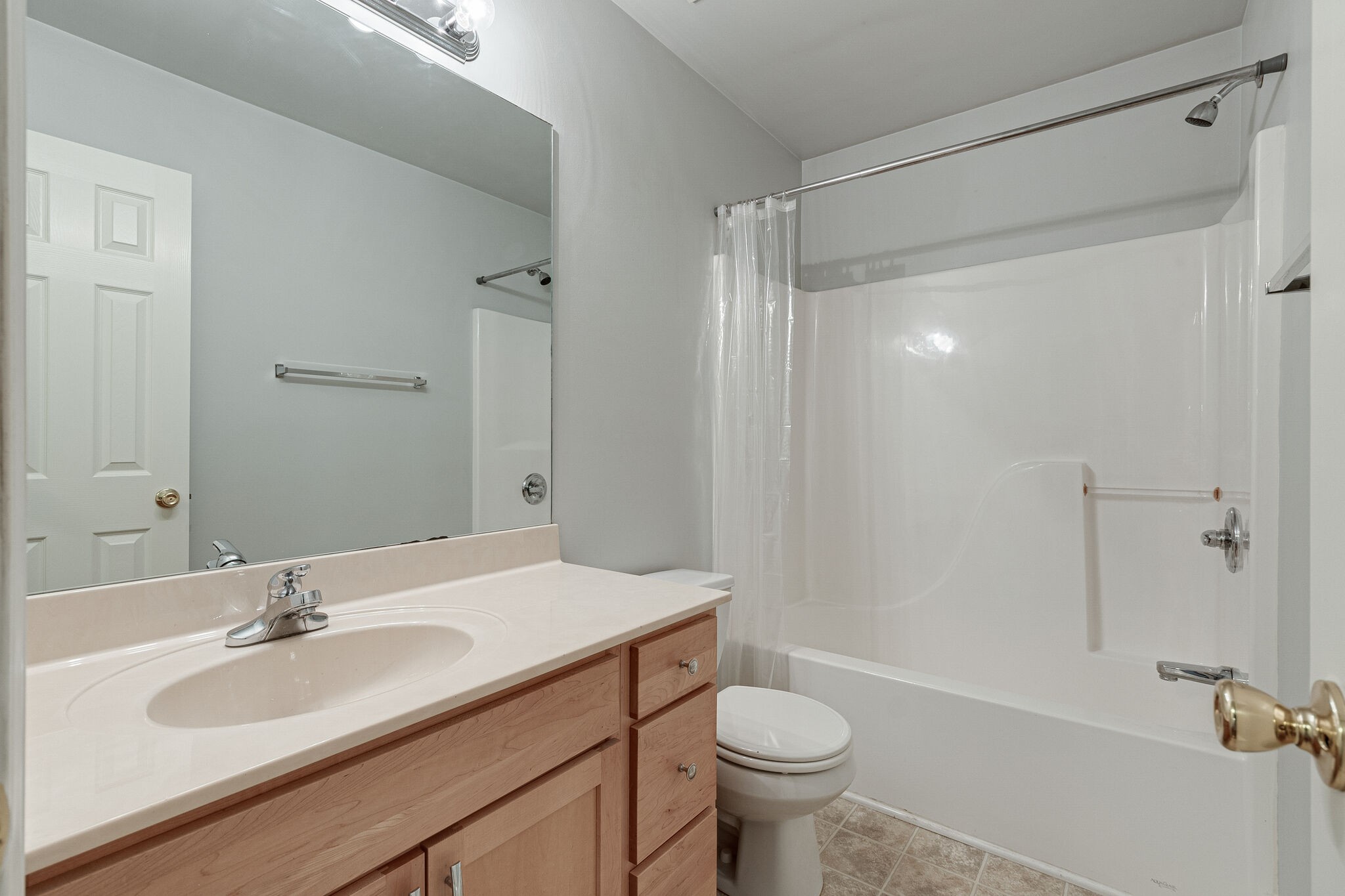 113 Lear Road Portland, TN 37148 - Photo 23 of 28 a bathroom with a sink toilet a mirror and shower