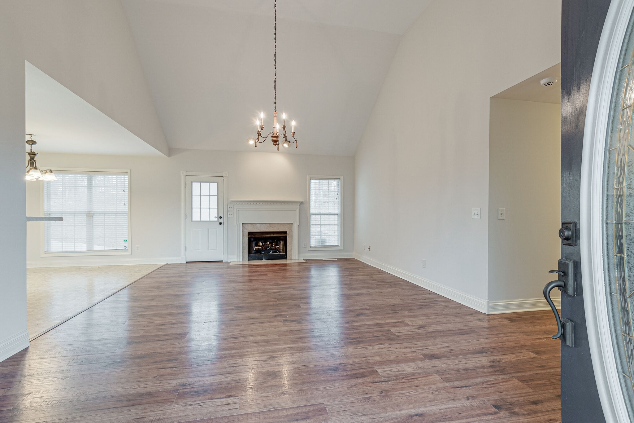 113 Lear Road Portland, TN 37148 - Photo 4 of 28 a view of empty room with wooden floor and fireplace