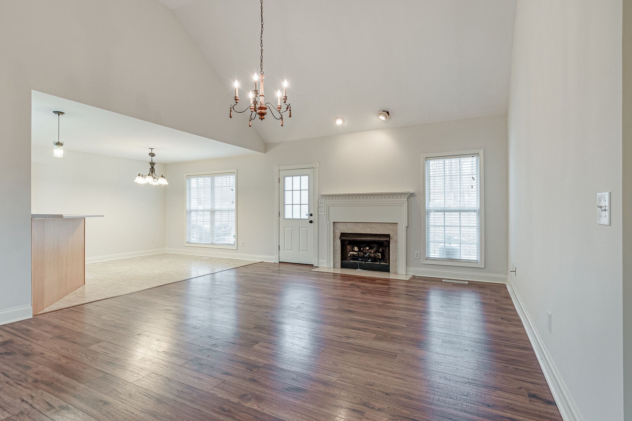113 Lear Road Portland, TN 37148 - Photo 5 of 28 a view of an empty room with wooden floor and a window