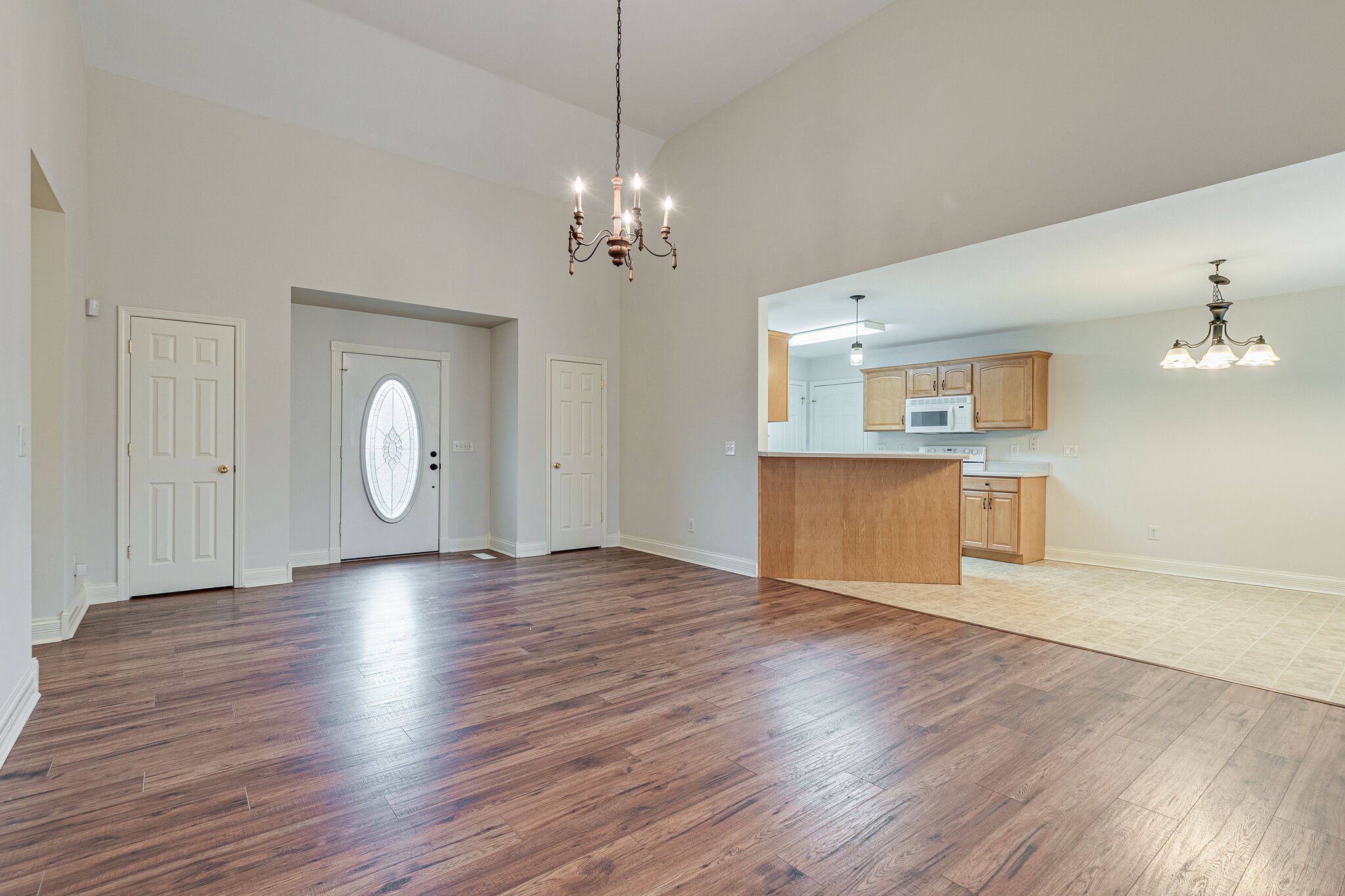 113 Lear Road Portland, TN 37148 - Photo 6 of 28 a view of a livingroom with wooden floor and a large window