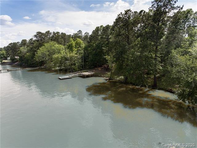 337 Rattlesnake Road, Unit 11 Ridgeway, SC 29130 - Photo 1 of 12 a view of a lake with trees in the background