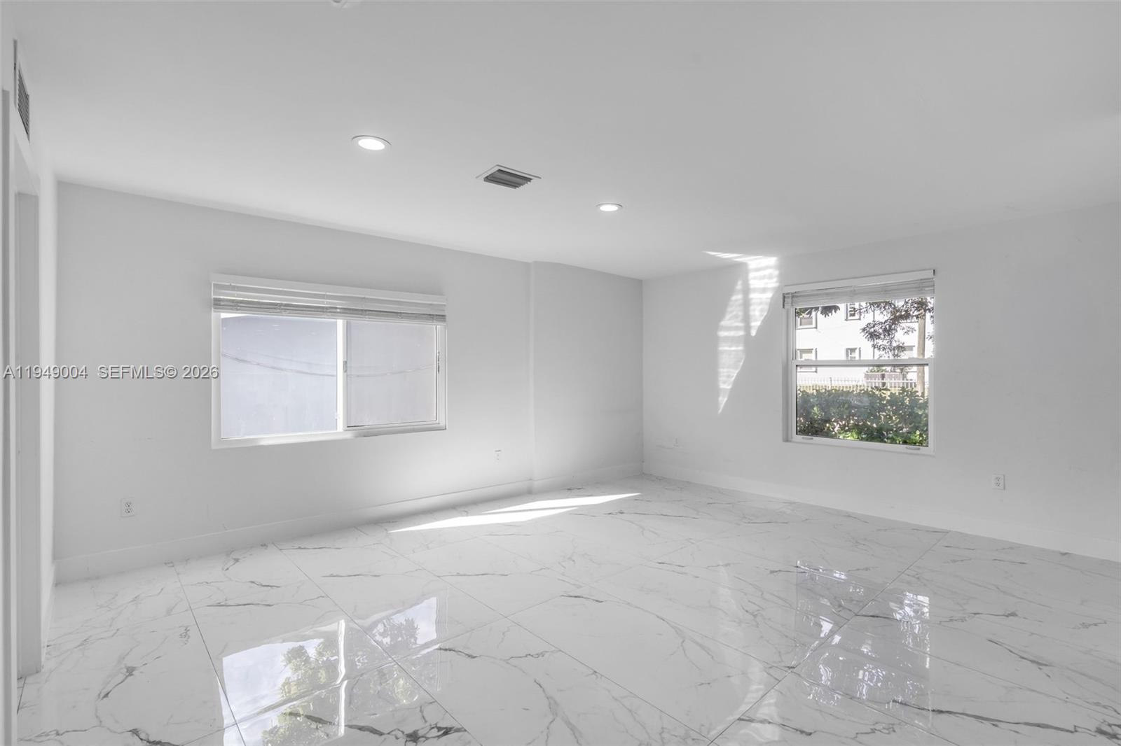 1786 Southwest 14th Terrace Miami, FL 33145 - Photo 14 of 41 a view of an empty room with a window