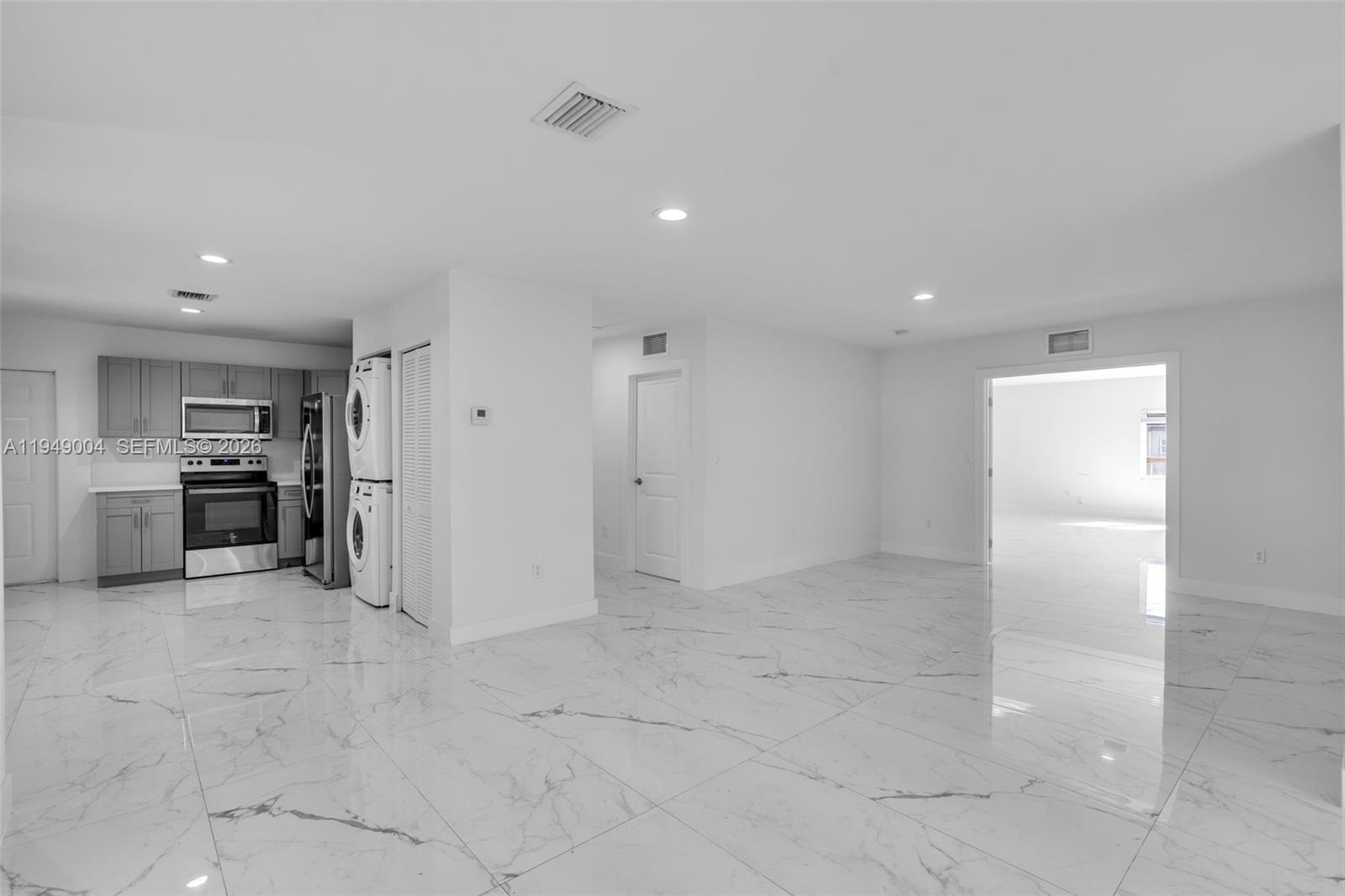 1786 Southwest 14th Terrace Miami, FL 33145 - Photo 17 of 41 a view of a kitchen with refrigerator and chairs