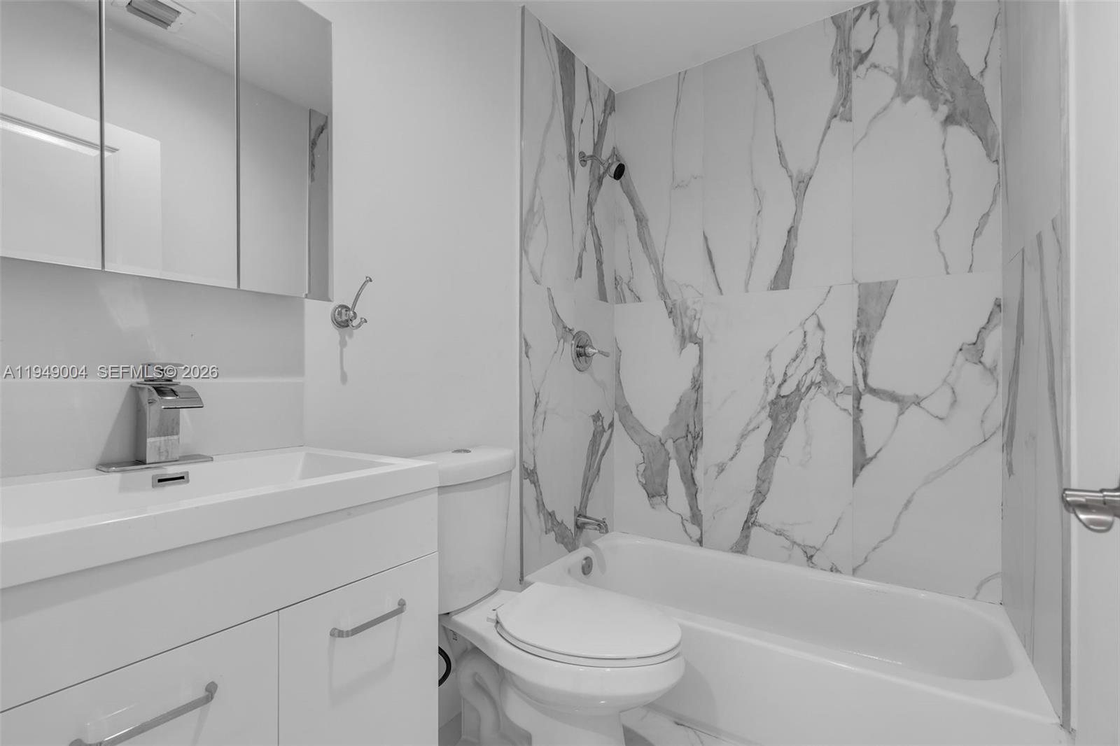 1786 Southwest 14th Terrace Miami, FL 33145 - Photo 18 of 41 a bathroom with a sink toilet and shower