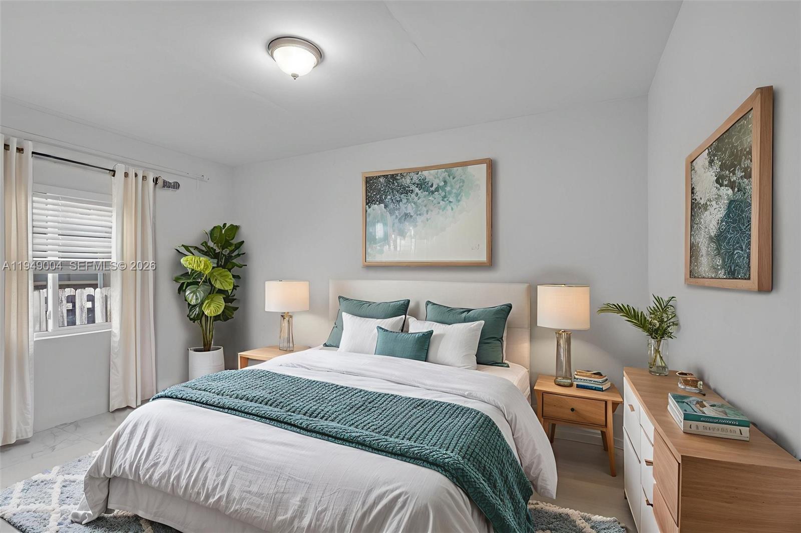 1786 Southwest 14th Terrace Miami, FL 33145 - Photo 20 of 41 a bedroom with a bed and a window