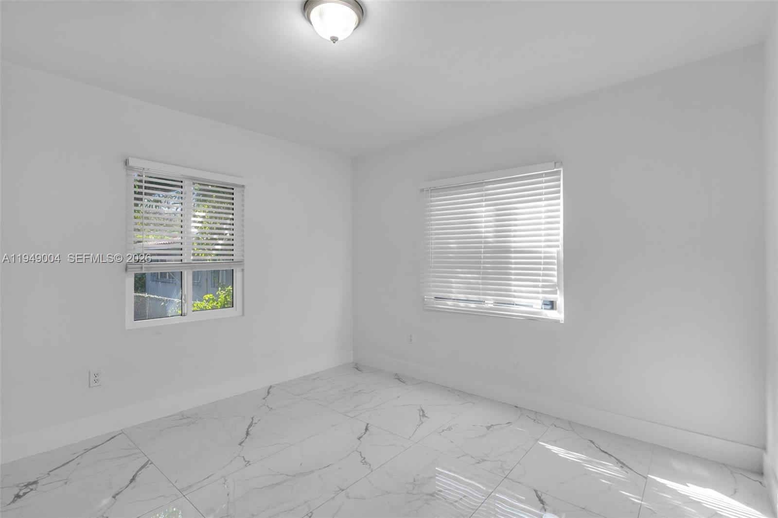 1786 Southwest 14th Terrace Miami, FL 33145 - Photo 22 of 41 an empty room with a window