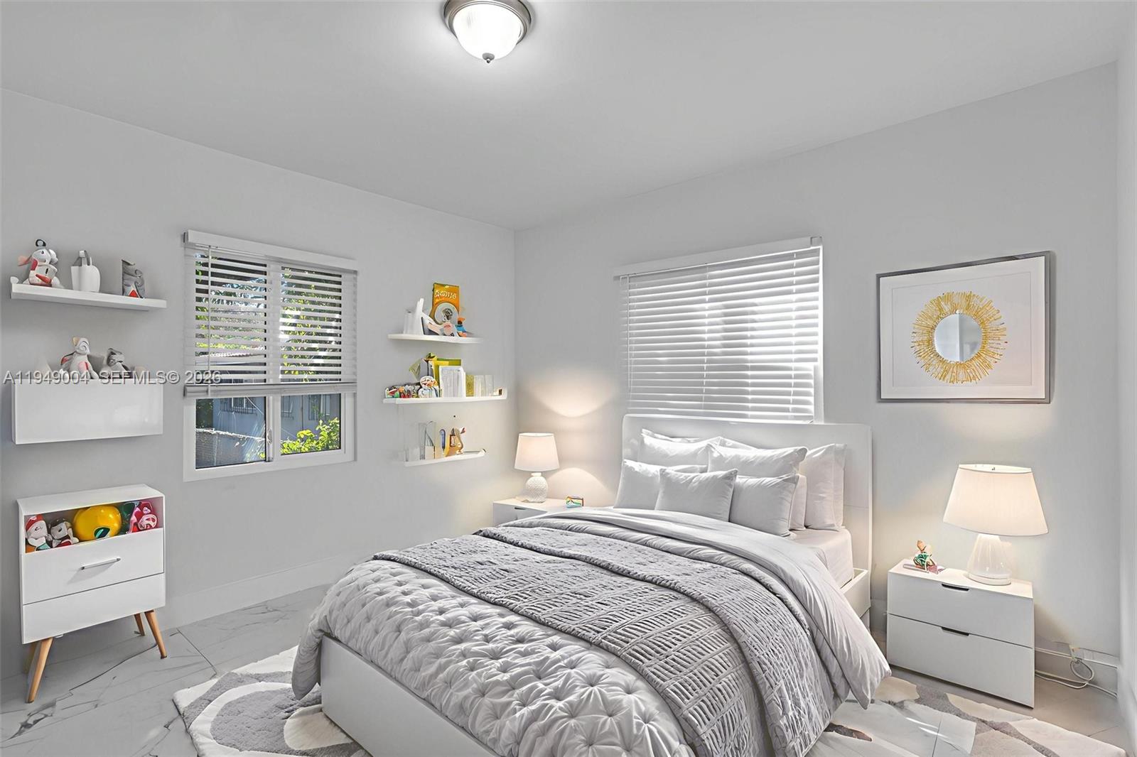 1786 Southwest 14th Terrace Miami, FL 33145 - Photo 23 of 41 a bedroom with a bed and a window