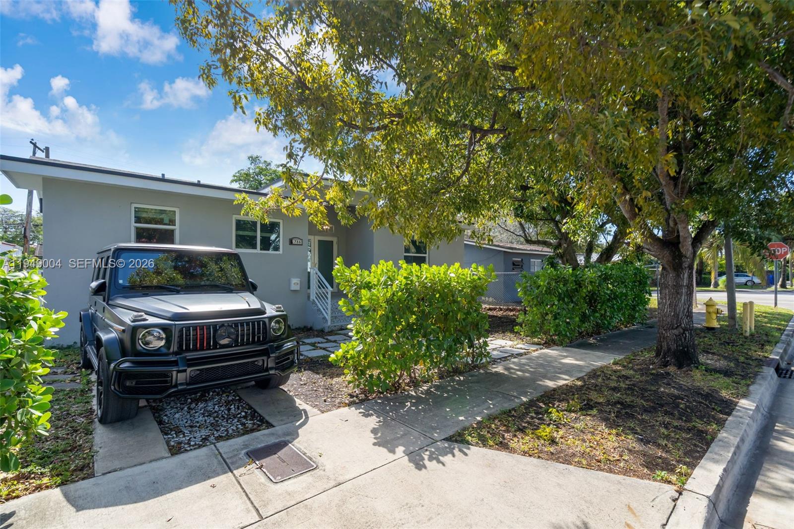 1786 Southwest 14th Terrace Miami, FL 33145 - Photo 3 of 41 a car parked in front of a house