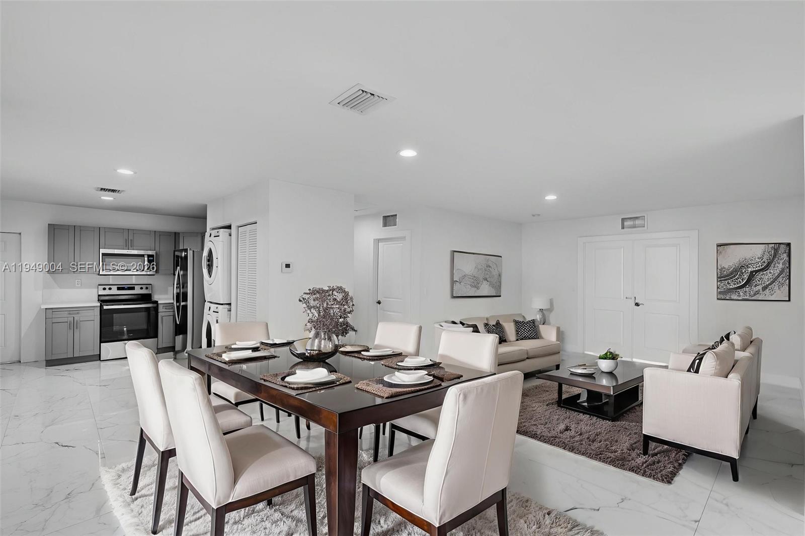 1786 Southwest 14th Terrace Miami, FL 33145 - Photo 6 of 41 a view of a dining room with furniture and wooden floor