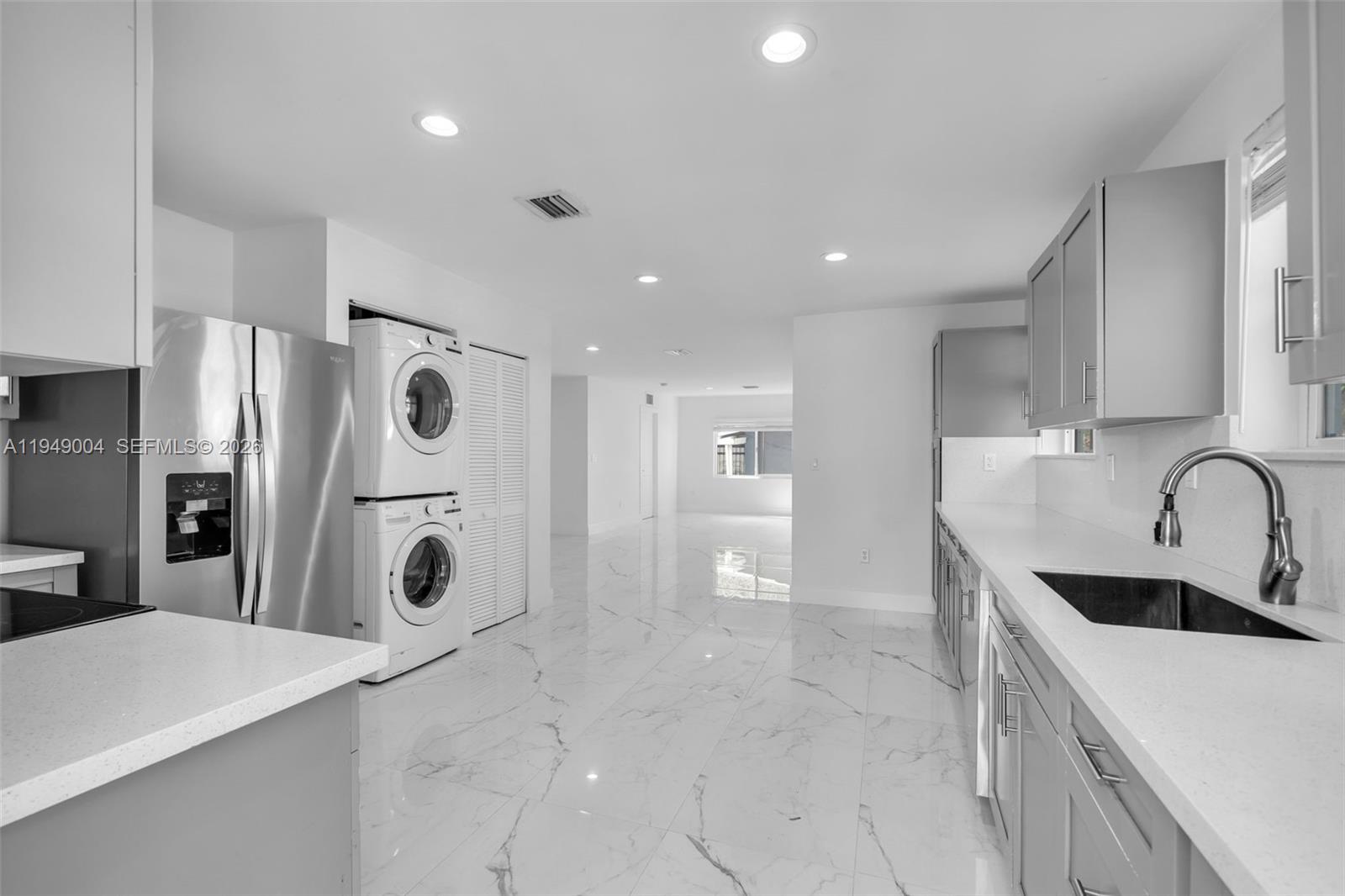 1786 Southwest 14th Terrace Miami, FL 33145 - Photo 9 of 41 a kitchen with refrigerator and cabinets
