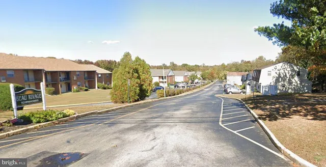 a view of a city street from a balcony