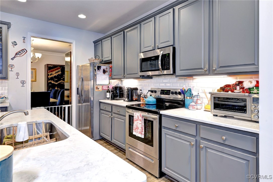 325 Martin Farm Road Yorktown, VA 23692 - Photo 16 of 50 Kitchen featuring stainless steel appliances, sink