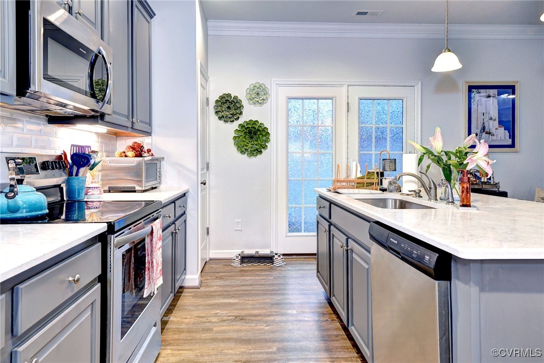 325 Martin Farm Road Yorktown, VA 23692 - Photo 18 of 50 Kitchen featuring tasteful backsplash, a center is