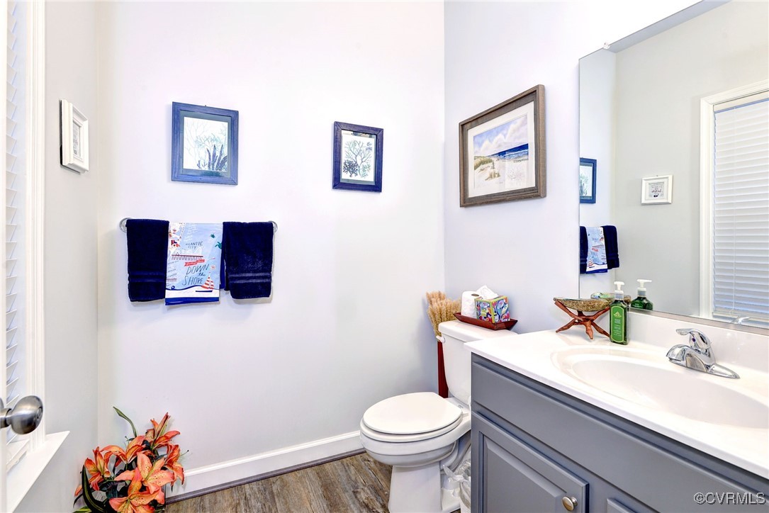325 Martin Farm Road Yorktown, VA 23692 - Photo 19 of 50 Bathroom featuring toilet, wood-type flooring, and