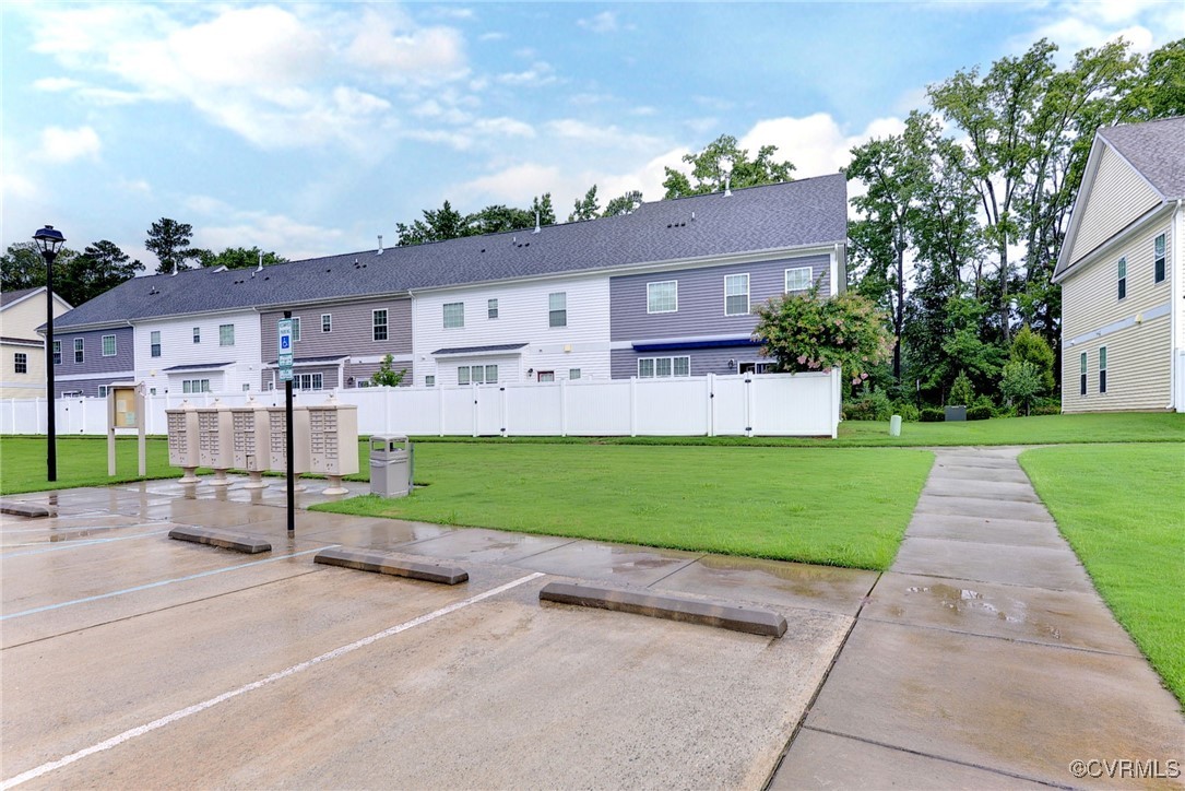 325 Martin Farm Road Yorktown, VA 23692 - Photo 39 of 50 Rear view of house featuring a lawn