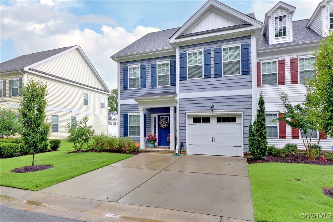 325 Martin Farm Road Yorktown, VA 23692 - Photo 4 of 50 View of front facade featuring a front yard and a