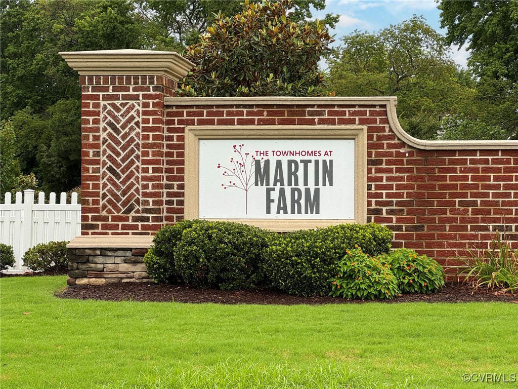 325 Martin Farm Road Yorktown, VA 23692 - Photo 43 of 50 Community / neighborhood sign with a lawn