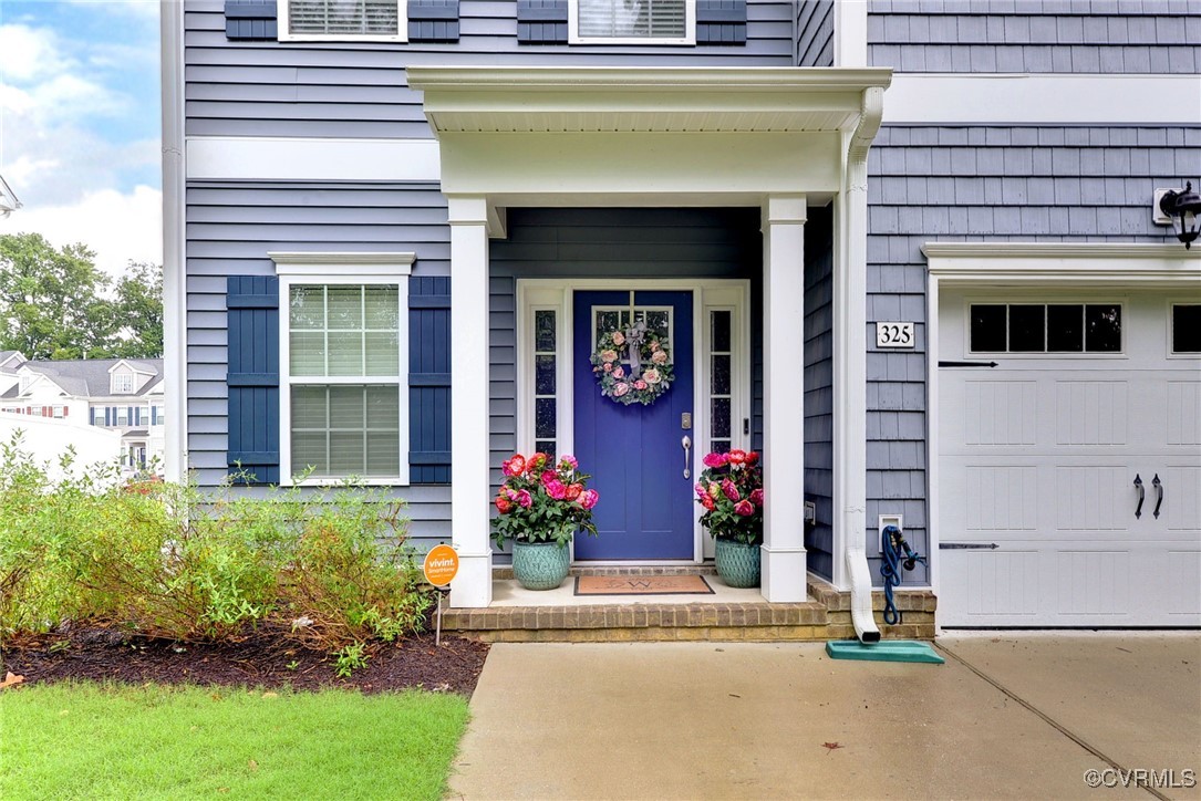 325 Martin Farm Road Yorktown, VA 23692 - Photo 6 of 50 Property entrance featuring a garage