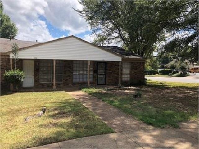 1174 Railton Road Memphis, TN 38111 - Photo 1 of 1 a house with yard in front of it