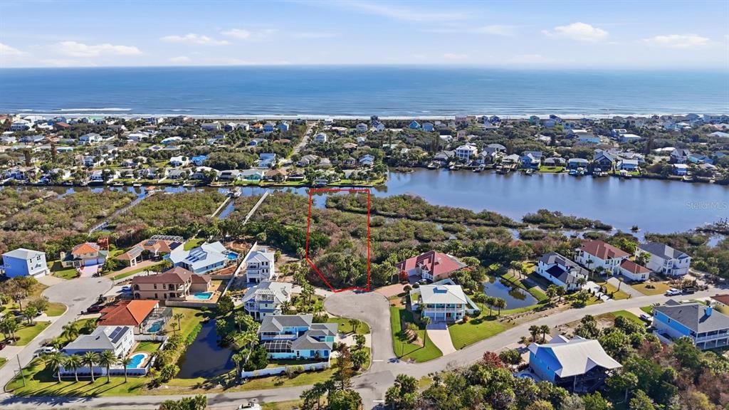 570 Springdale Drive Flagler Beach, FL 32136 - Photo 1 of 15 an aerial view of a city