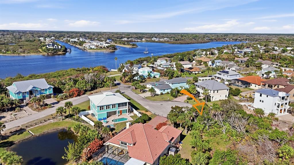 570 Springdale Drive Flagler Beach, FL 32136 - Photo 12 of 15 an aerial view of residential building with outdoor space