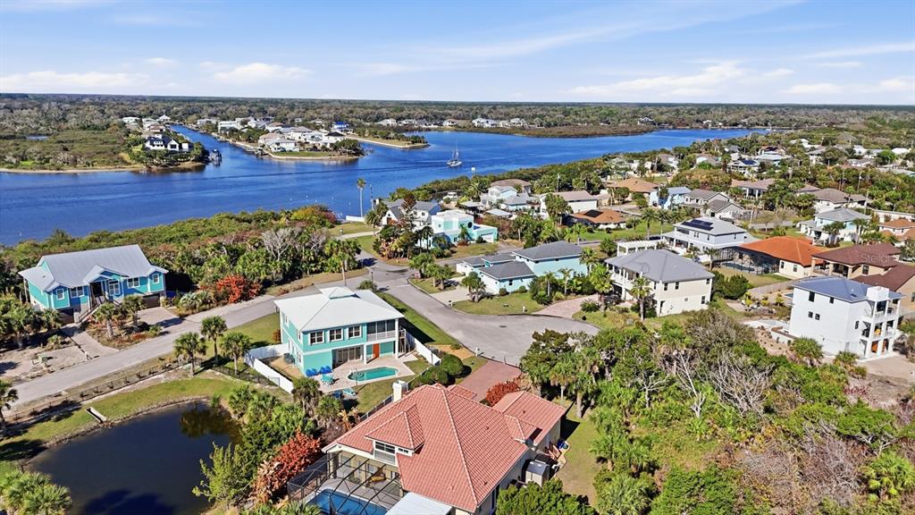 570 Springdale Drive Flagler Beach, FL 32136 - Photo 13 of 15 an aerial view of residential building with outdoor space