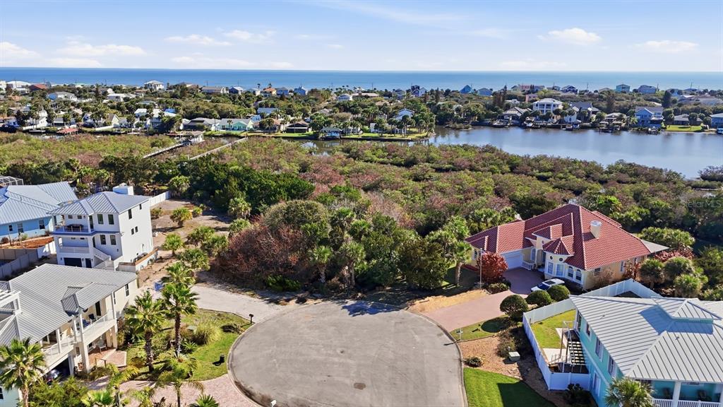 570 Springdale Drive Flagler Beach, FL 32136 - Photo 2 of 15 an aerial view of residential houses with outdoor space