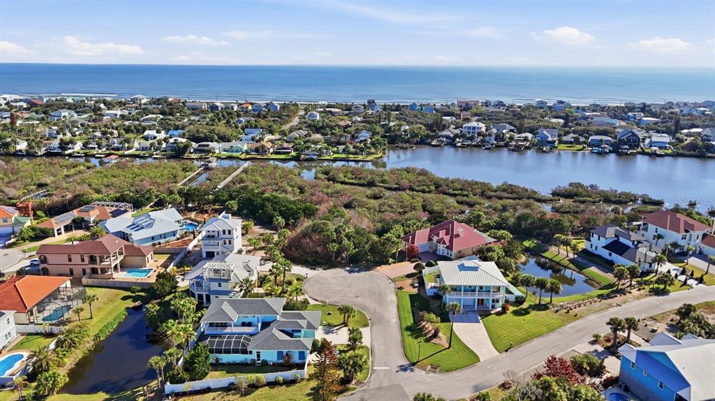 570 Springdale Drive Flagler Beach, FL 32136 - Photo 3 of 15 an aerial view of a city