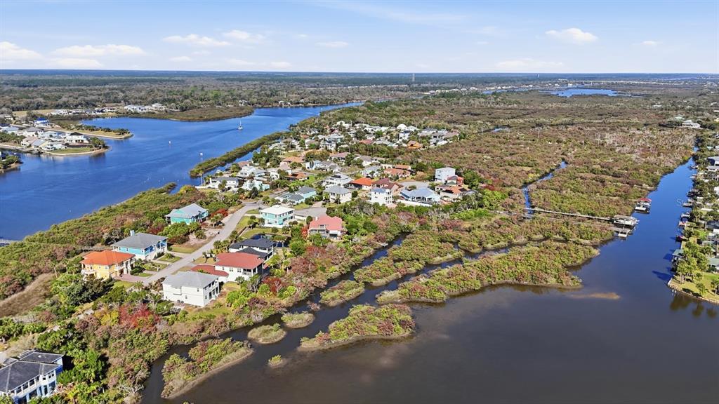 570 Springdale Drive Flagler Beach, FL 32136 - Photo 7 of 15 an aerial view of residential houses with outdoor space