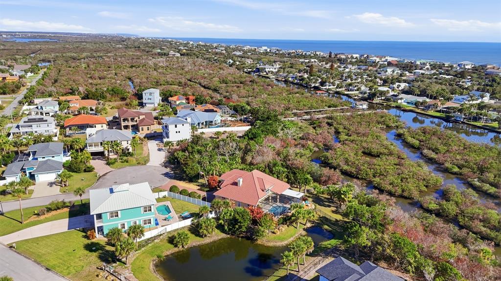 570 Springdale Drive Flagler Beach, FL 32136 - Photo 10 of 15 an aerial view of residential houses with outdoor space