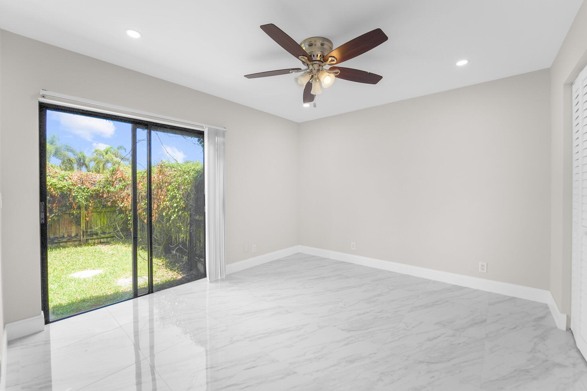 22207 Alyssum Way Boca Raton, FL 33433 - Photo 11 of 31 an empty room with window