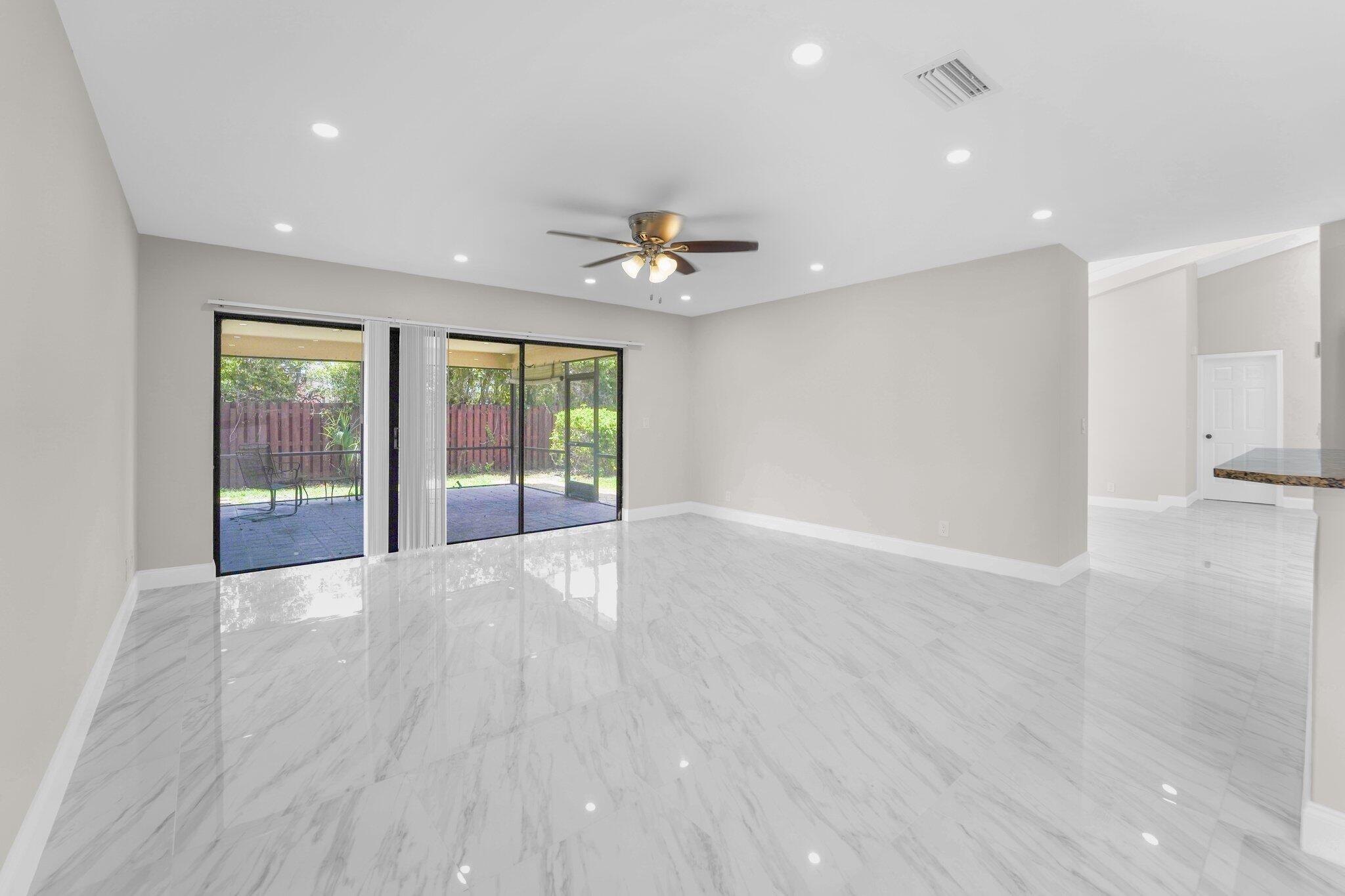 22207 Alyssum Way Boca Raton, FL 33433 - Photo 12 of 31 a view of an empty room with a window