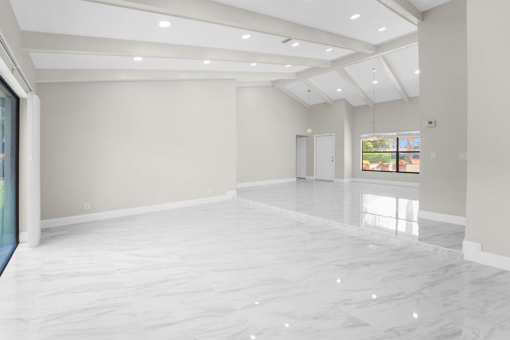 22207 Alyssum Way Boca Raton, FL 33433 - Photo 15 of 31 an empty room with windows and entrance