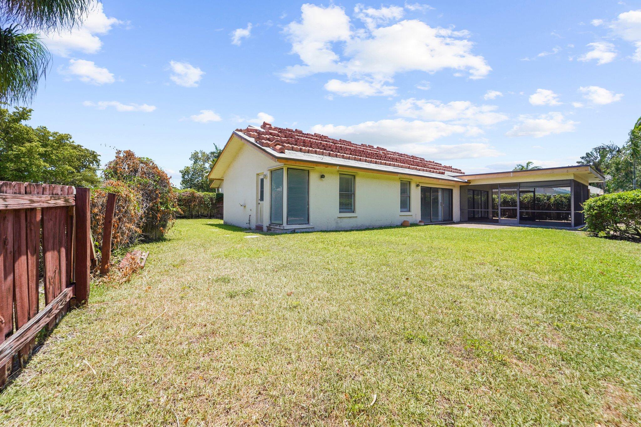 22207 Alyssum Way Boca Raton, FL 33433 - Photo 29 of 31 a view of house with yard and entertaining space