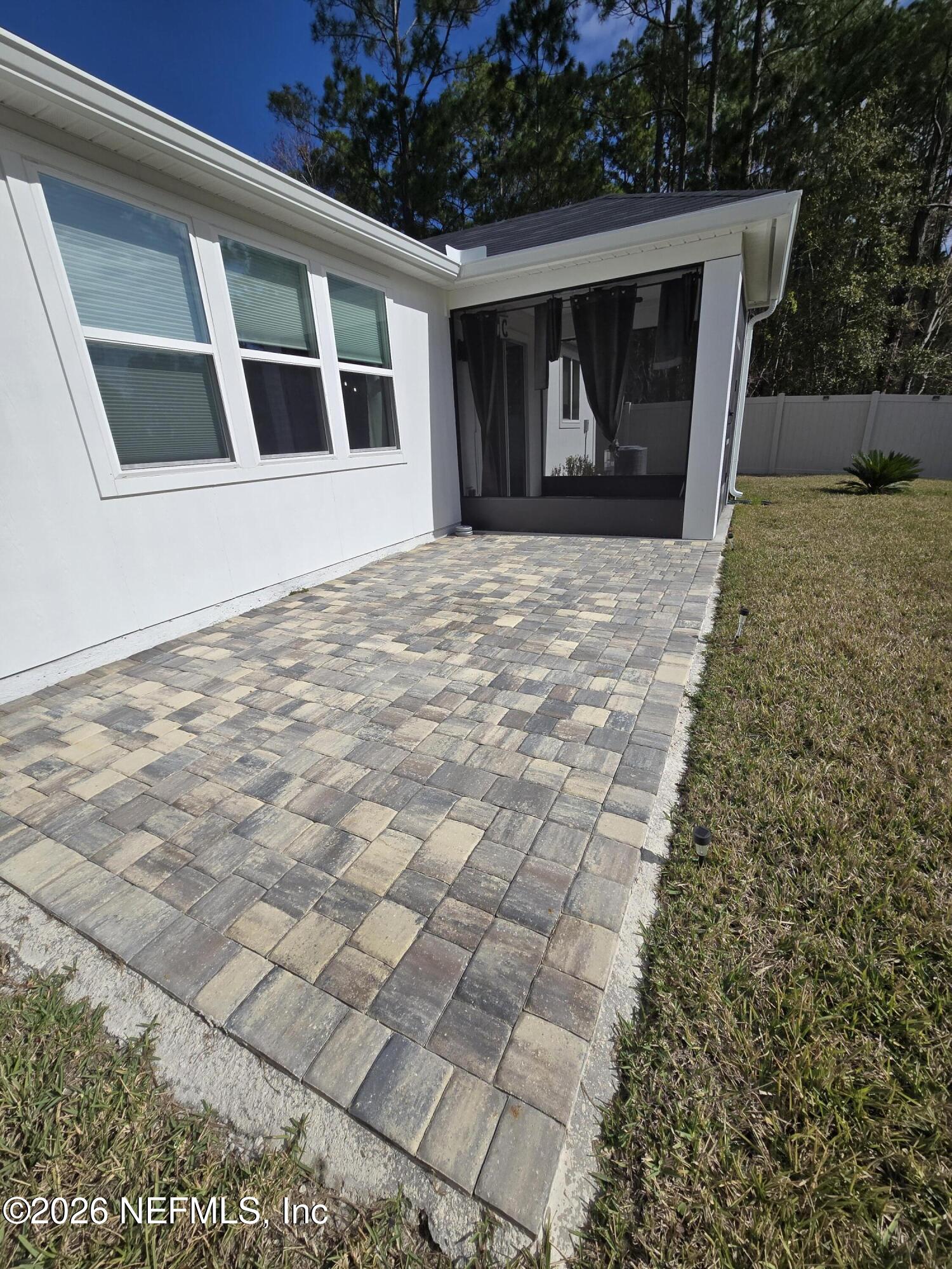 6788 Burnt Crk Road Jacksonville, FL 32222 - Photo 20 of 25 a front view of a house with a yard