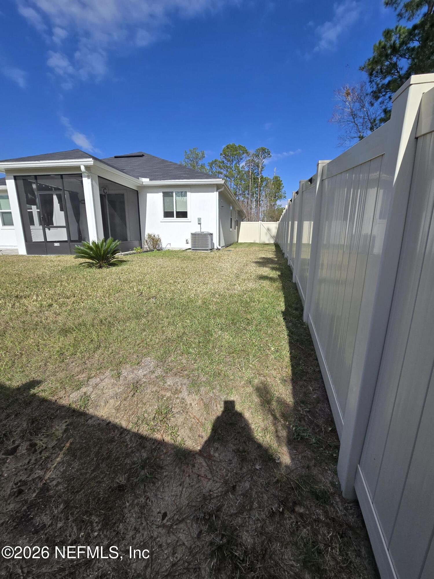 6788 Burnt Crk Road Jacksonville, FL 32222 - Photo 22 of 25 a front view of a house with a yard