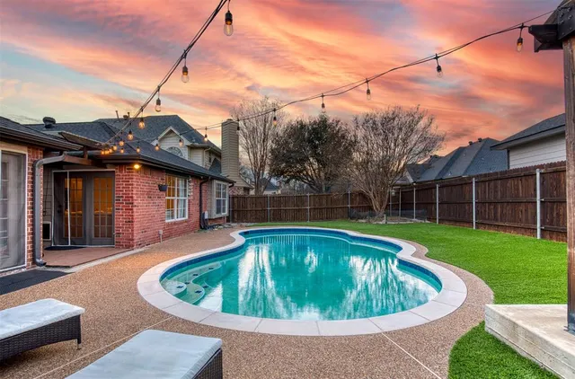 a view of a house with a swimming pool