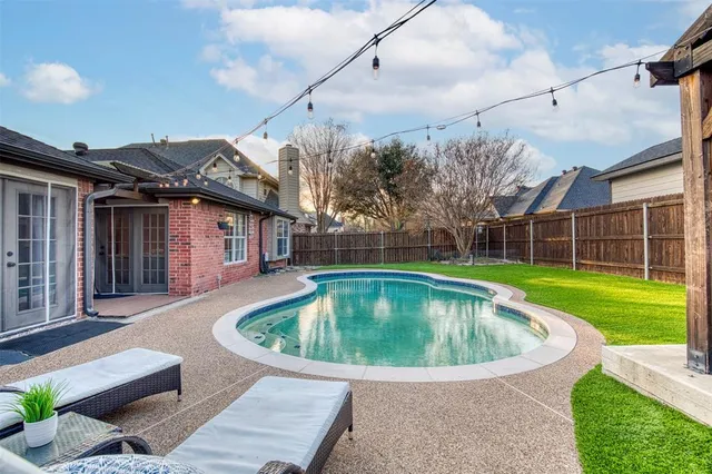 a view of a house with a swimming pool
