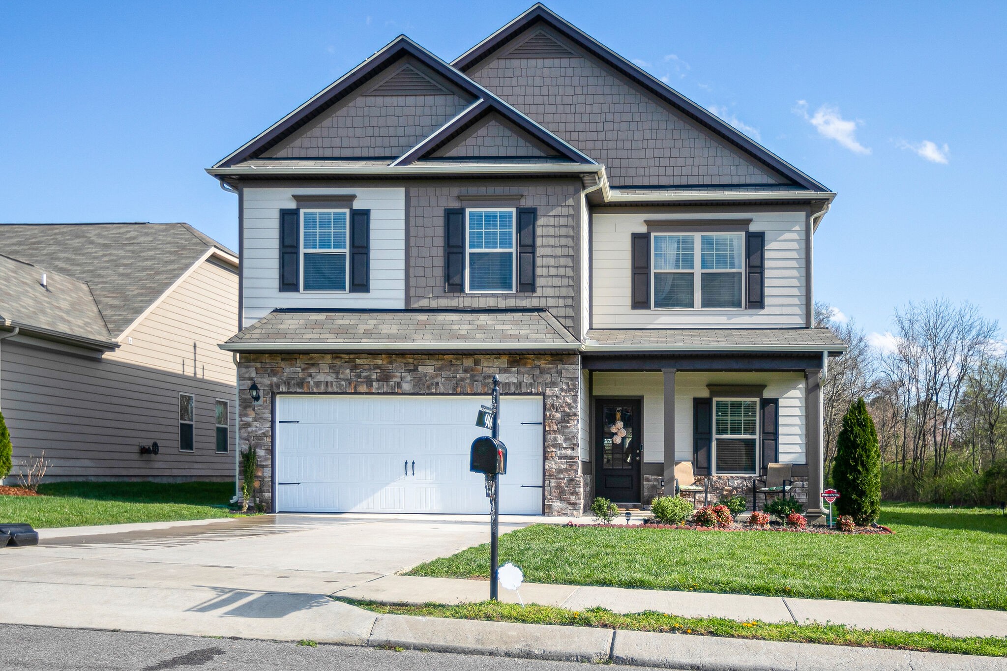 966 Carnation Drive Spring Hill, TN 37174 - Photo 1 of 31 a front view of a house with garden