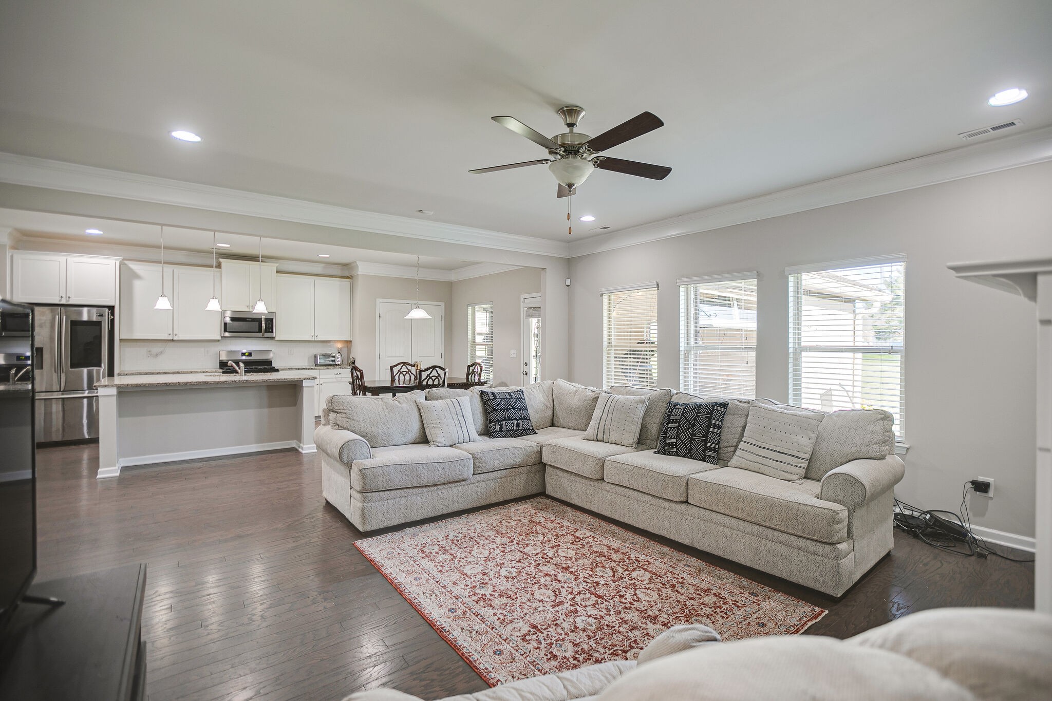 966 Carnation Drive Spring Hill, TN 37174 - Photo 11 of 31 a living room with furniture and a view of kitchen