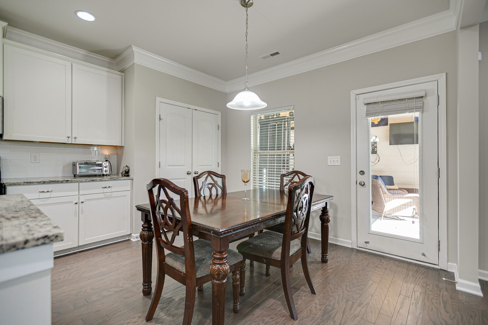 966 Carnation Drive Spring Hill, TN 37174 - Photo 12 of 31 a dining room with furniture and window