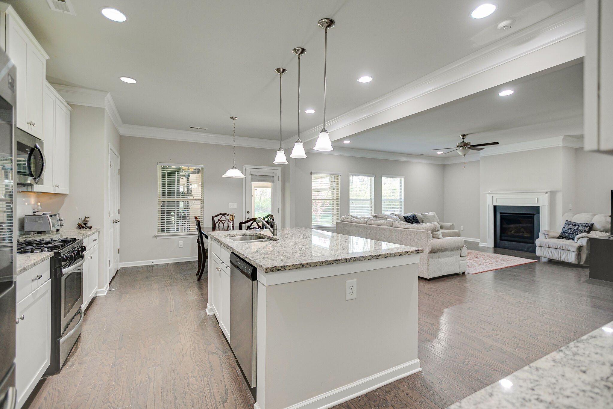966 Carnation Drive Spring Hill, TN 37174 - Photo 14 of 31 a kitchen with a sink stove and cabinets