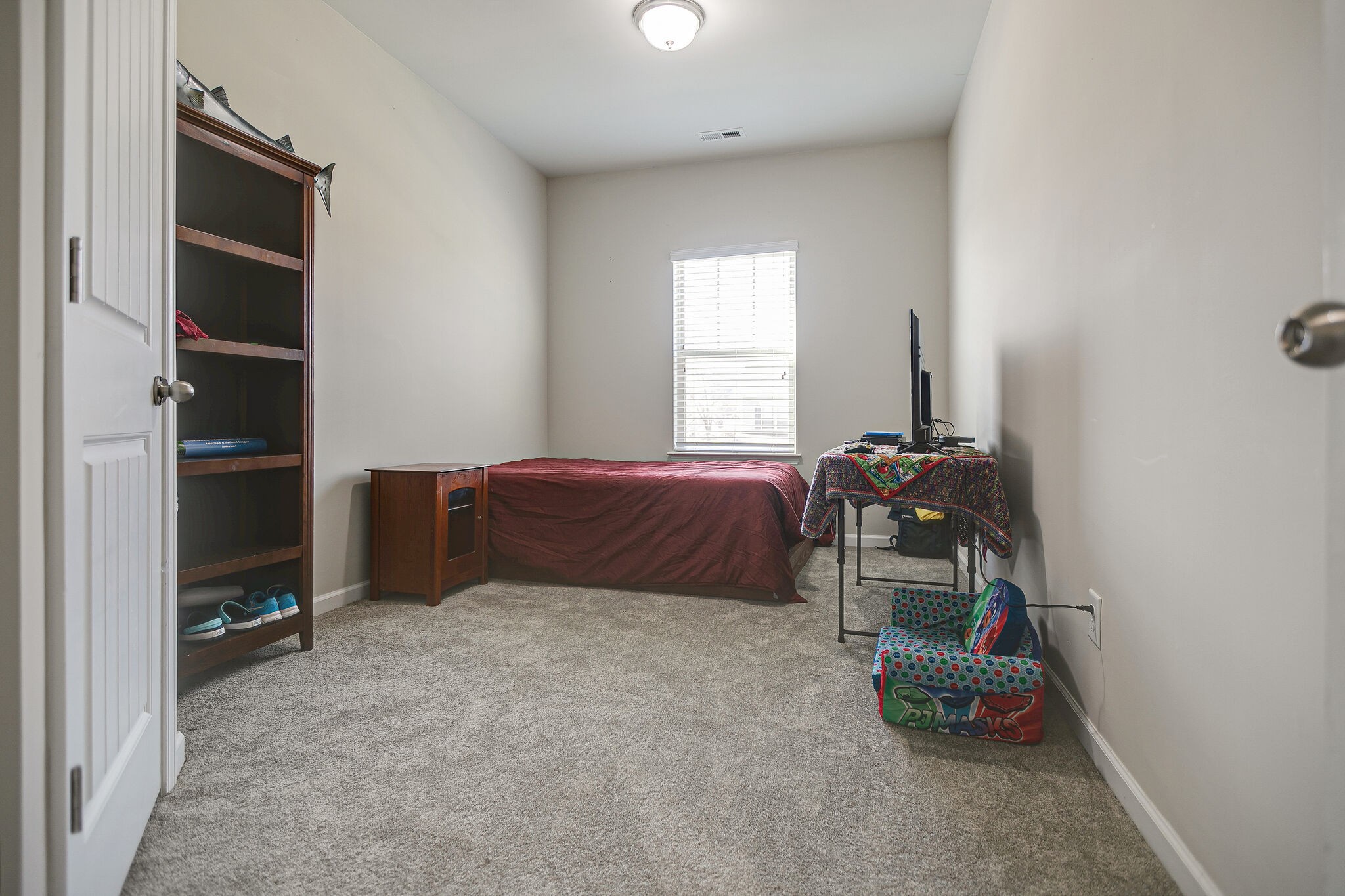 966 Carnation Drive Spring Hill, TN 37174 - Photo 23 of 31 a bed room with a bed and a window