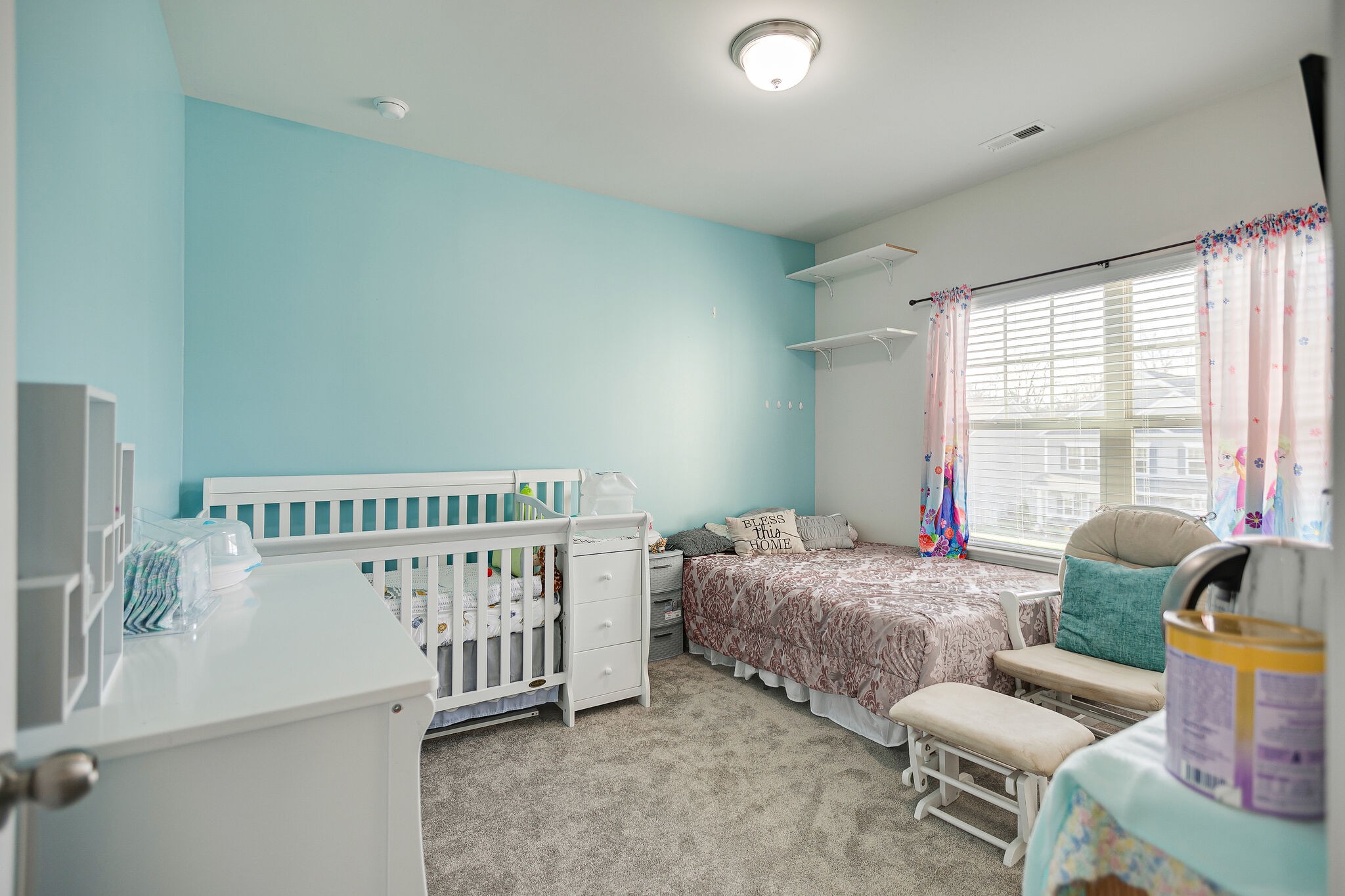 966 Carnation Drive Spring Hill, TN 37174 - Photo 24 of 31 a bedroom with furniture and a window