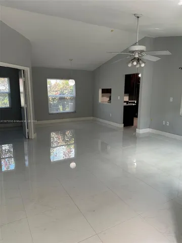 a view of a livingroom with furniture