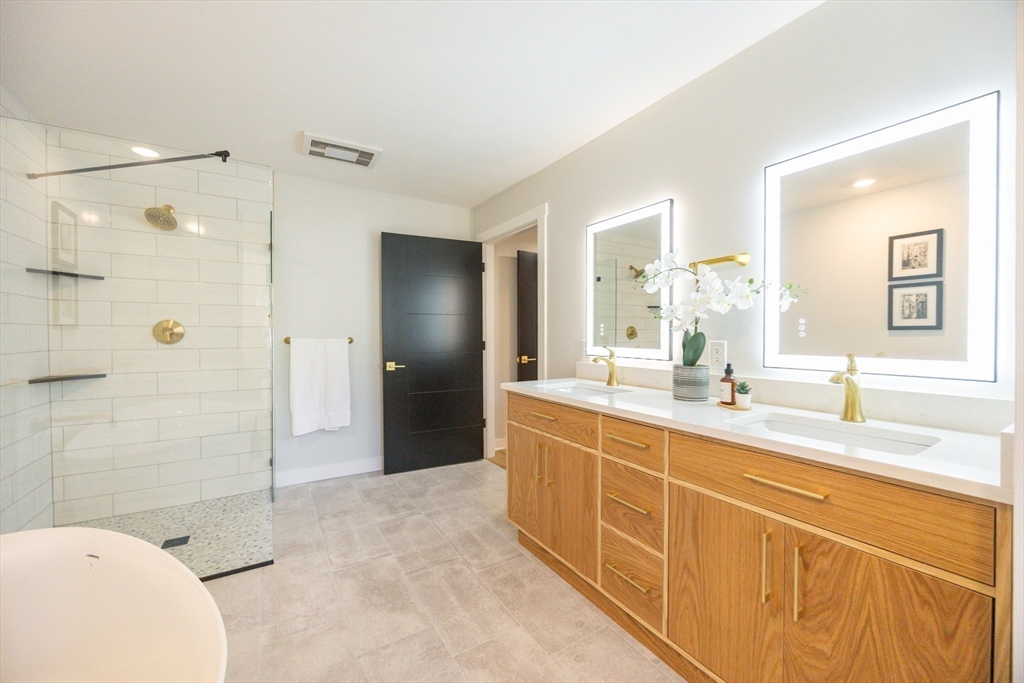 Lot 4 Pickering Road Blackstone, MA 01504 - Photo 15 of 19 a spacious bathroom with a granite countertop sink mirror and shower